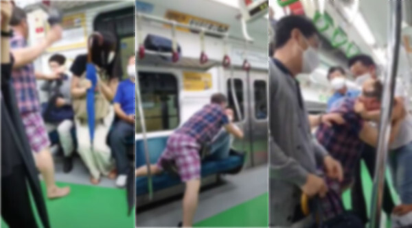 지하철 마스크 싸움이 벌어졌다.(사진=유튜브 영상 캡처)