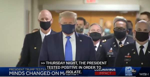 트럼프 대통령이 마스크를 쓰고 이동하고 있다.(wisn12news)